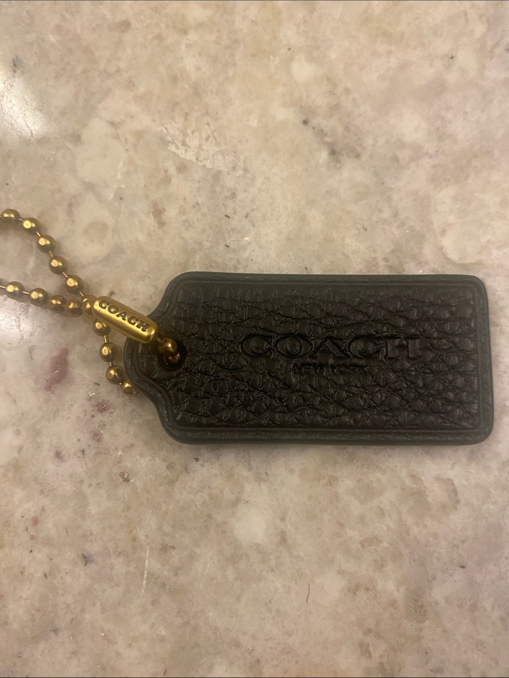 Coach Black Pebbled Leather Bag Tag Key Holder with Gold Chain that says Coach